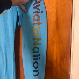 Aviator Nation Turquoise sweatpants with Rainbow Logo